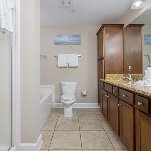 Indulge in relaxation in the master bath with a refreshing walk-in shower and soothing jetted tub
