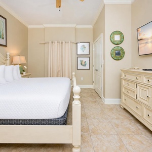 Relax on the cozy king bed in this guest suite and stream your favorite shows after a beach day