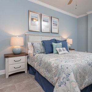 Sink into the plush king bedding and enjoy a peaceful night's rest in this master bedroom retreat