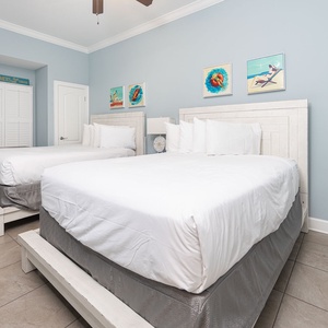 Relax on one of the cozy queen beds in this guest suite and enjoy a peaceful slumber