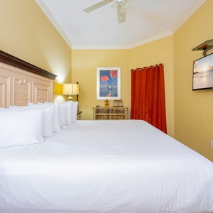 Relax on the cozy king bed in this guest suite and stream your favorite shows after a beach day