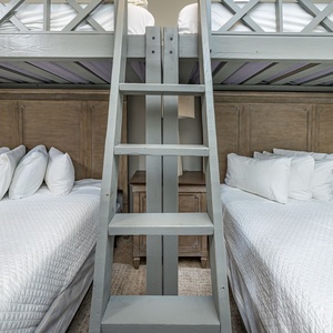 Convenient built-in ladder provides easy access to the top bunks
