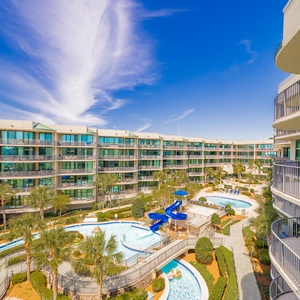 Discover the pool area with a refreshing lazy river and thrilling waterslide, just steps from the bay