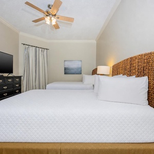 Unwind in this queen guest suite and stream your favorite shows or enjoy a good movie after a beach day