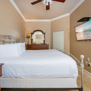Relax on the cozy king bed in this guest suite and stream your favorite shows after a beach day