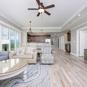 Experience tranquility while relaxing in the inviting living area, surrounded by coastal views and tasteful decor