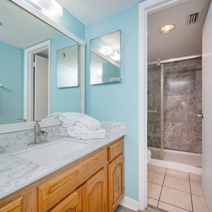 Light from the vanity brightens your master bath as you prepare for a day of adventures on the shore
