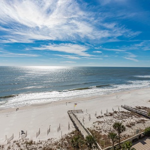 Breathe in the fresh beach air while lounging on your balcony, taking in the stunning coastal views