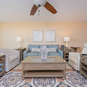 Relax on the sofa with a queen sleeper, enjoying family conversations as you take in the warmth of the coastal vibe