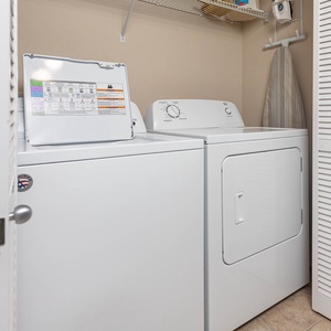 This laundry area features a washer and dryer, providing convenience for guests during their stay