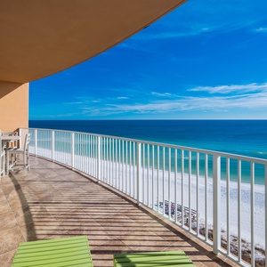 Watch the coastline stretch into the distance and the horizon meet the sky from your balcony while you soak up the sun