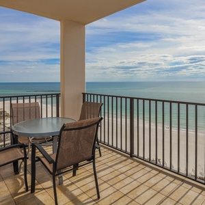 Enjoy meals or drinks on the balcony while taking in the tranquil views of the water and beach