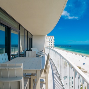 Enjoy meals at the outdoor table while soaking in sweeping views of the tranquil waters and shoreline