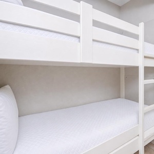 Bunk beds in the hallway offer a cozy spot for the kids after fun-filled days along the coast