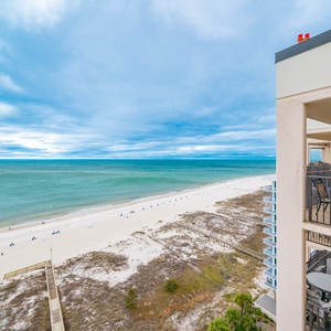 Relax on your balcony, enjoying panoramic coastal views and the calming sounds of beach life all around you