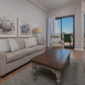 Unwind on the cozy sofa with queen sleeper surrounded by stunning views from the outdoor patio area