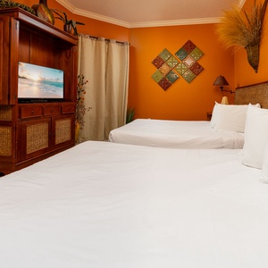 Unwind in this queen guest suite and stream your favorite shows or enjoy a good movie after a beach day