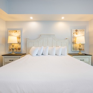 Drift into comfort in the king master suite, surrounded by serene decor and ready for restful nights on the beach