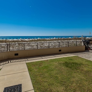 Direct patio access to the outdoor pool area, grilling station, and splash park amenities