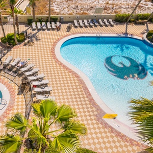 Discover the refreshing pool area with gradual entry, indoor hot tubs and pool, lazy river, and waterslide