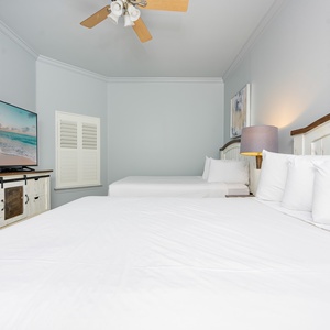 Unwind in this queen guest suite and stream your favorite shows or enjoy a good movie after a beach day