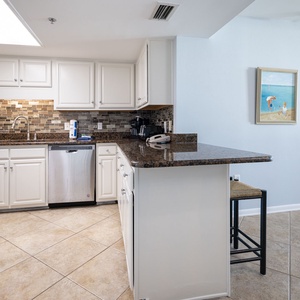 Sip your morning coffee at the breakfast bar with your favorite cup from the Keurig with pod or traditional brewing