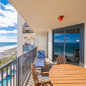 Savor the view from the balcony, perfect for enjoying the tranquil waters