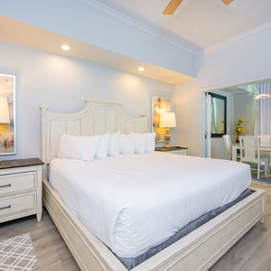 Unwind after a day at the beach in this elegant king master suite surrounded by stylish coastal accents