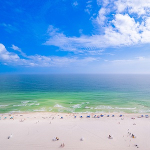 Gaze at the beautiful coast from your balcony while relaxing to the soothing sounds of waves and warm sun