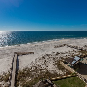 Beautiful coastal view with sparkling waters and serene beach, perfect for a relaxing getaway