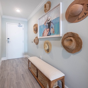 Hang your hat, sit on the cushioned bench, and slip on shoes before stepping into your gulf coast retreat
