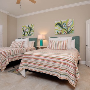 Drift into comfort in this queen guest suite, where soft bedding promotes restful nights and relaxation awaits