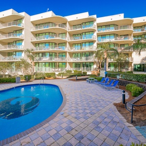 Discover the pool area with a refreshing lazy river and thrilling waterslide, just steps from the bay