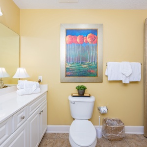 Refresh in this guest bath, enjoying the tranquil vibe with bright decor and soft towels awaiting you
