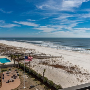This inviting space features a stunning beachfront view, perfect for relaxation and enjoying the serene atmosphere