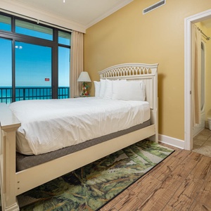 Relax in this queen guest suite, taking in the calming coastal views that invite peaceful moments to start your day