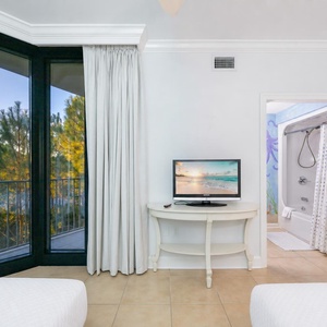 Unwind in this queen guest suite and stream your favorite shows or enjoy a good movie after a fun vacation day