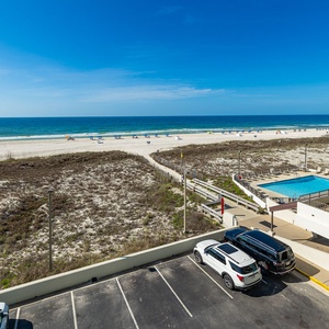 Enjoy stunning views from your balcony while soaking in the sunshine and listening to the gentle sounds of the coast