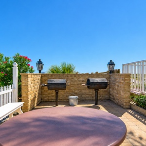 Relax at the picnic area with grills, perfect for outdoor dining by the pool or cooking your catch after a fishing day