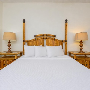 Cozy guest suite with a queen bed where you rest after a day filled with coastal adventures