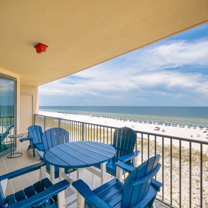 Relax at the outdoor seating area, enjoying refreshing views and the gentle sounds of the waves nearby