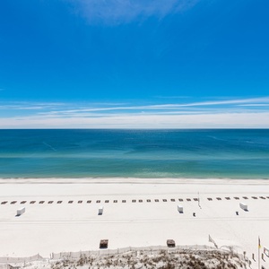 Enjoy breathtaking views of the calm waters and shoreline from your spacious balcony, perfect for relaxation