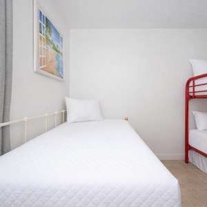 Unwind in the bunk room with a stunning view and a twin bed and a twin over full bunk
