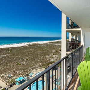 Savor the coastal vibe at your balcony table, where you can soak in breathtaking views and refreshing sounds