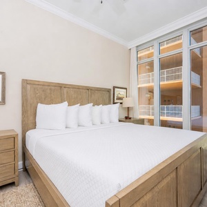Relax on the cozy king bed in this guest suite and stream your favorite shows after a beach day