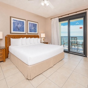 Experience serene mornings in the king master suite, with shimmering coastal views inviting you to relax and unwind