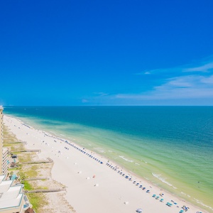 Watch the coastline stretch into the distance and the horizon meet the sky from your balcony while you soak up the sun