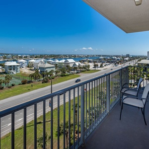 Enjoy the fresh air from the guest balcony while taking in views of the vibrant coastal community and waterways