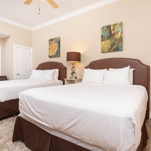 Experience restful nights on one of the queens in the guest room, complemented by decor that enhances your serene getaway