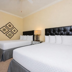 Rest in comfort on the queen beds, perfect for a restful night after beach adventures with your family